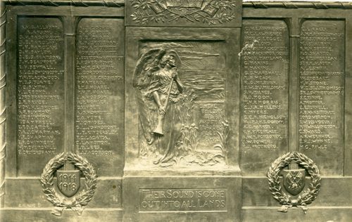 Relief sculpture of an angel holding a long, straight trumpet, looking towards a rising sun in the distance. The words 'Until the day break and the shadows flee away' are inscribed next to them, and beneath are the words 'Their Sound is gone out into all Lands'.
