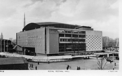 Black and white photo of a large, square building with the words 'Royal Festival Hall' on the side.